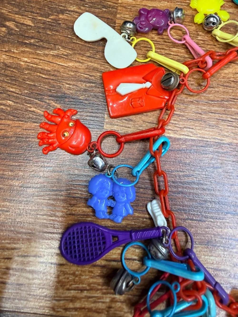 1980s BELL CHARMS Plastic Link Chain Necklace with 23 Charms